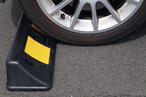 Radstopper L500xB160xH100mm PVC schwarz mit gelben Reflexstreifen
